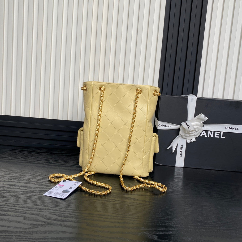CRUISE DRAWSTRING BACKPACK 24 IN YELLOW LAMBSKIN GOLD-TONE METALLIC
