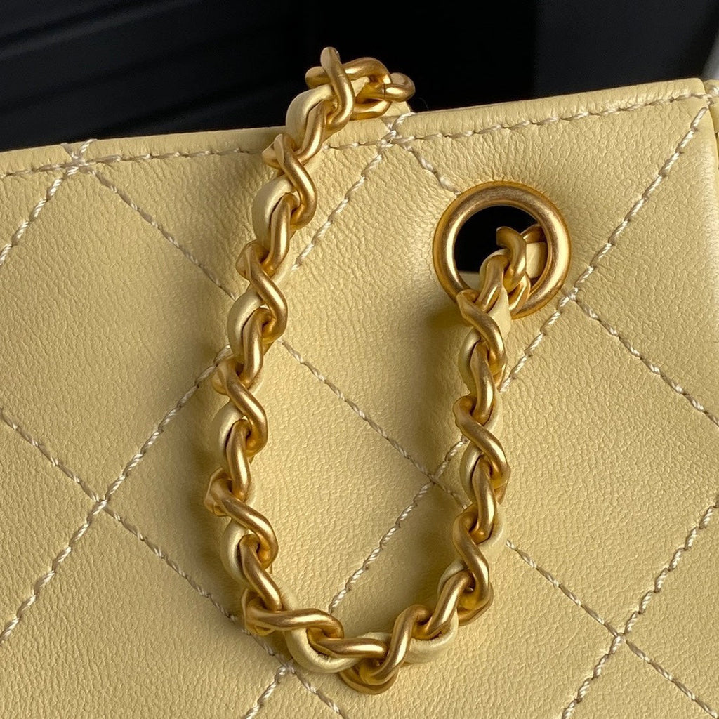 CRUISE DRAWSTRING BACKPACK 24 IN YELLOW LAMBSKIN GOLD-TONE METALLIC